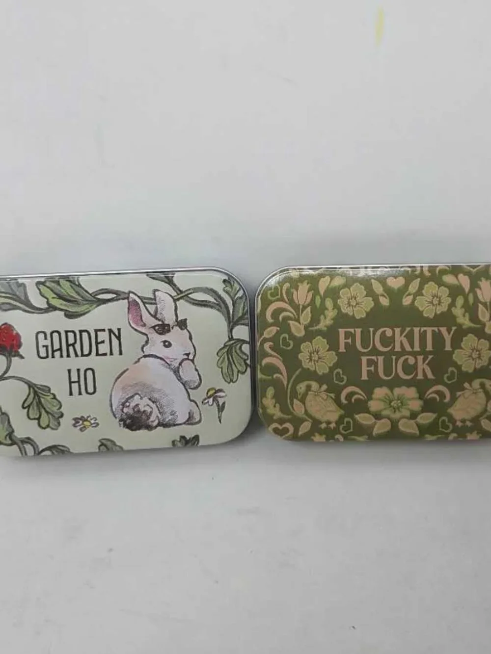 Set of 2 Urban Outfitters sentiment tin box scented candles Garden Ho bunny